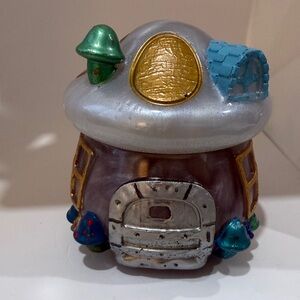 Whimsical Mushroom House with Colorful Accents